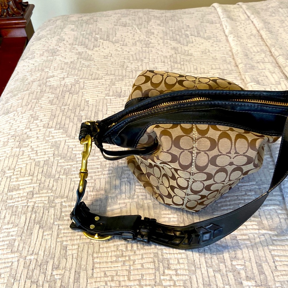 Coach brown & tan canvas shoulder bag.